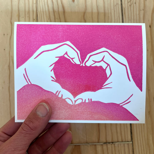 Heart hands in pink